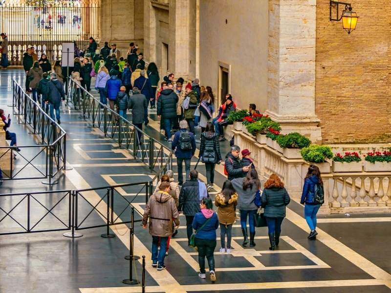 People waiting at Vatican Museums entrance in line